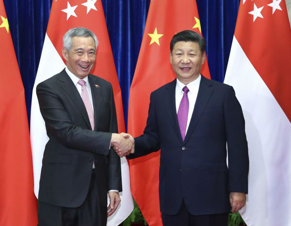 9月20日，国家主席习近平在北京人民大会堂会见来华进行正式访问的新加坡总理李显龙。新华社